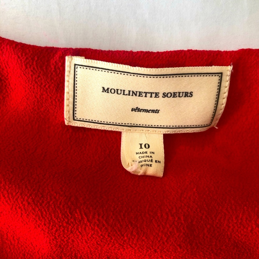 Excellent condition. S 10 w/ tassels and Pom poms